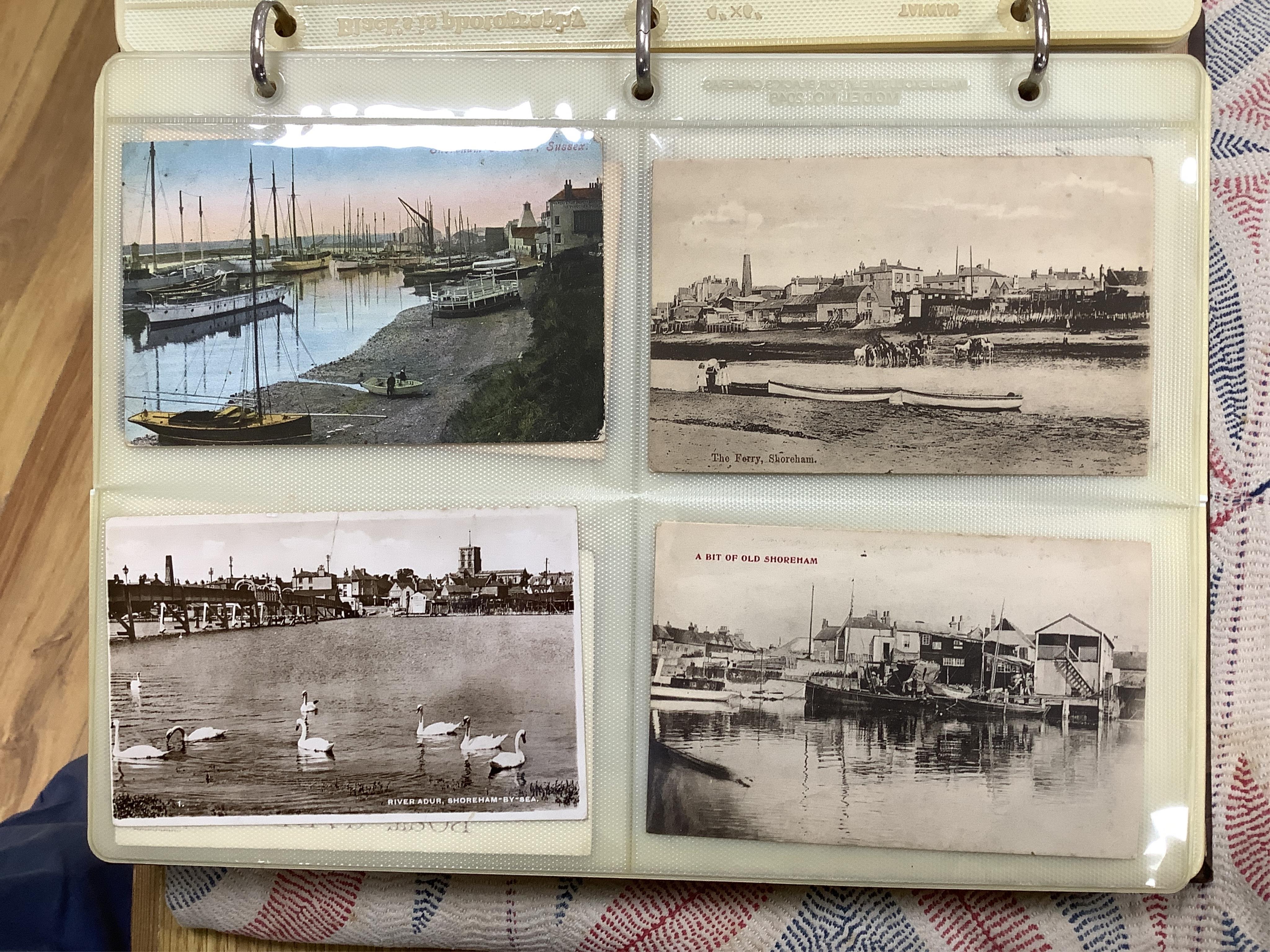 Three assorted postcard albums; a good selection of Brighton, Hove and Environs. Condition - as viewed